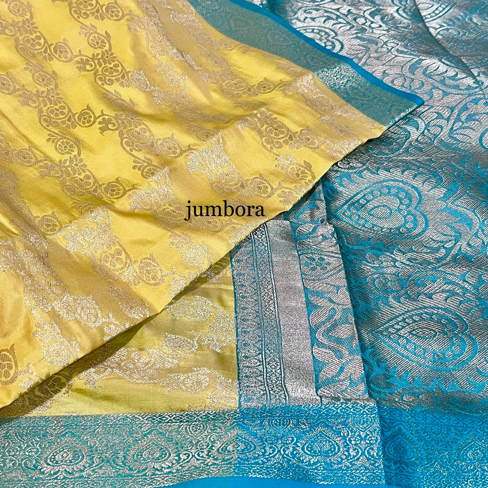 Pastel Yellow & Sea Green Jangla Banarasi Silk Saree with stitched Blouse