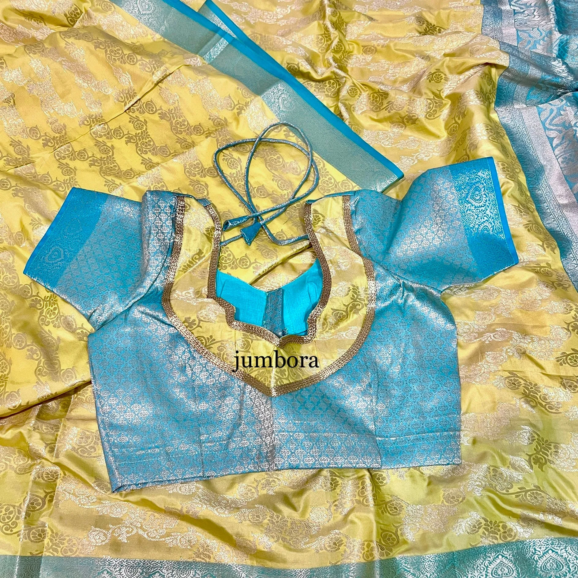 Pastel Yellow & Sea Green Jangla Banarasi Silk Saree with stitched Blouse